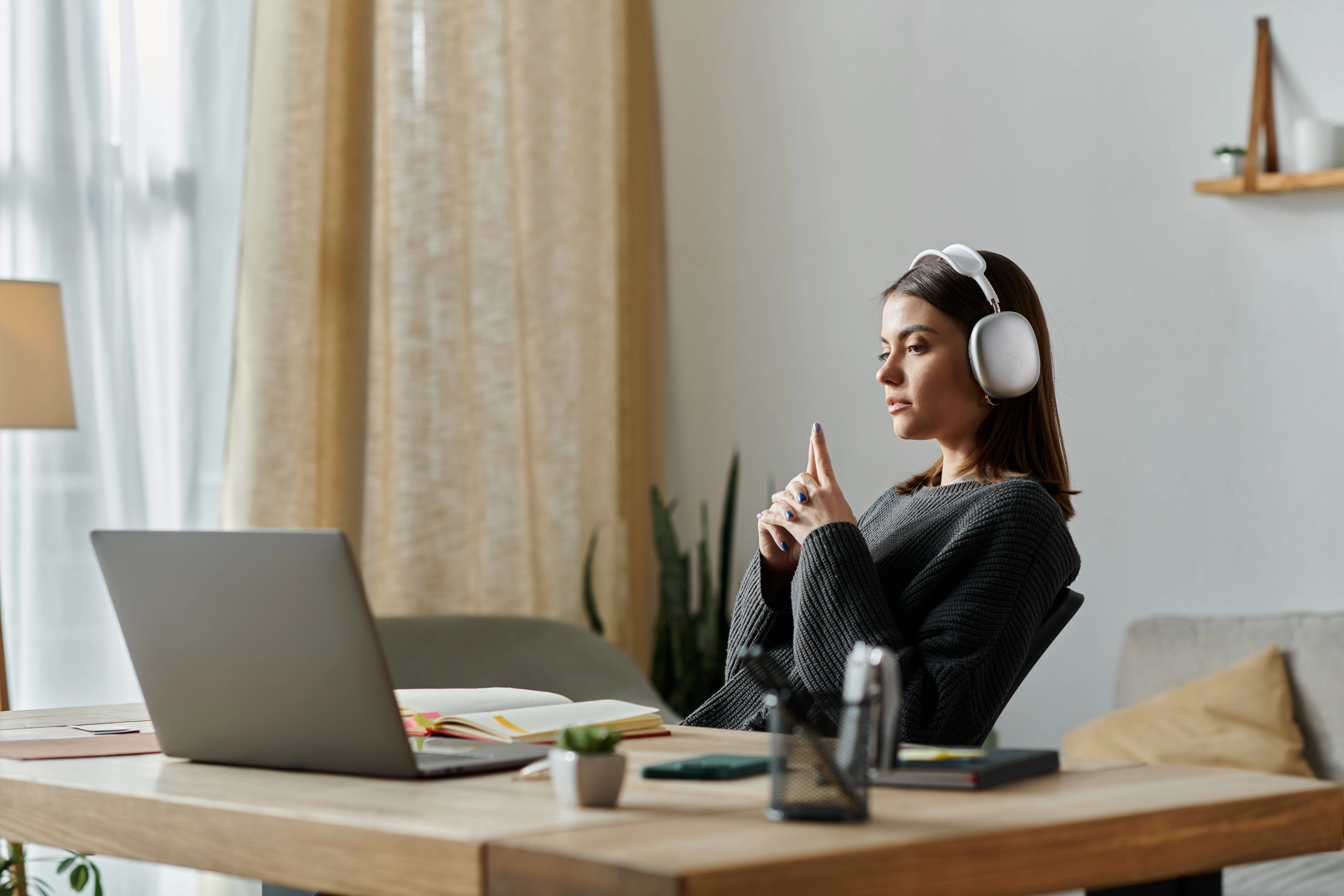 Woman watching BACKSTAGE w/ The Sober Curator